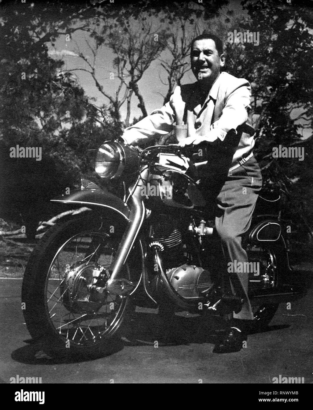 Former Argentinian President, Juan Domingo Peron, riding a motorbike Stock Photo