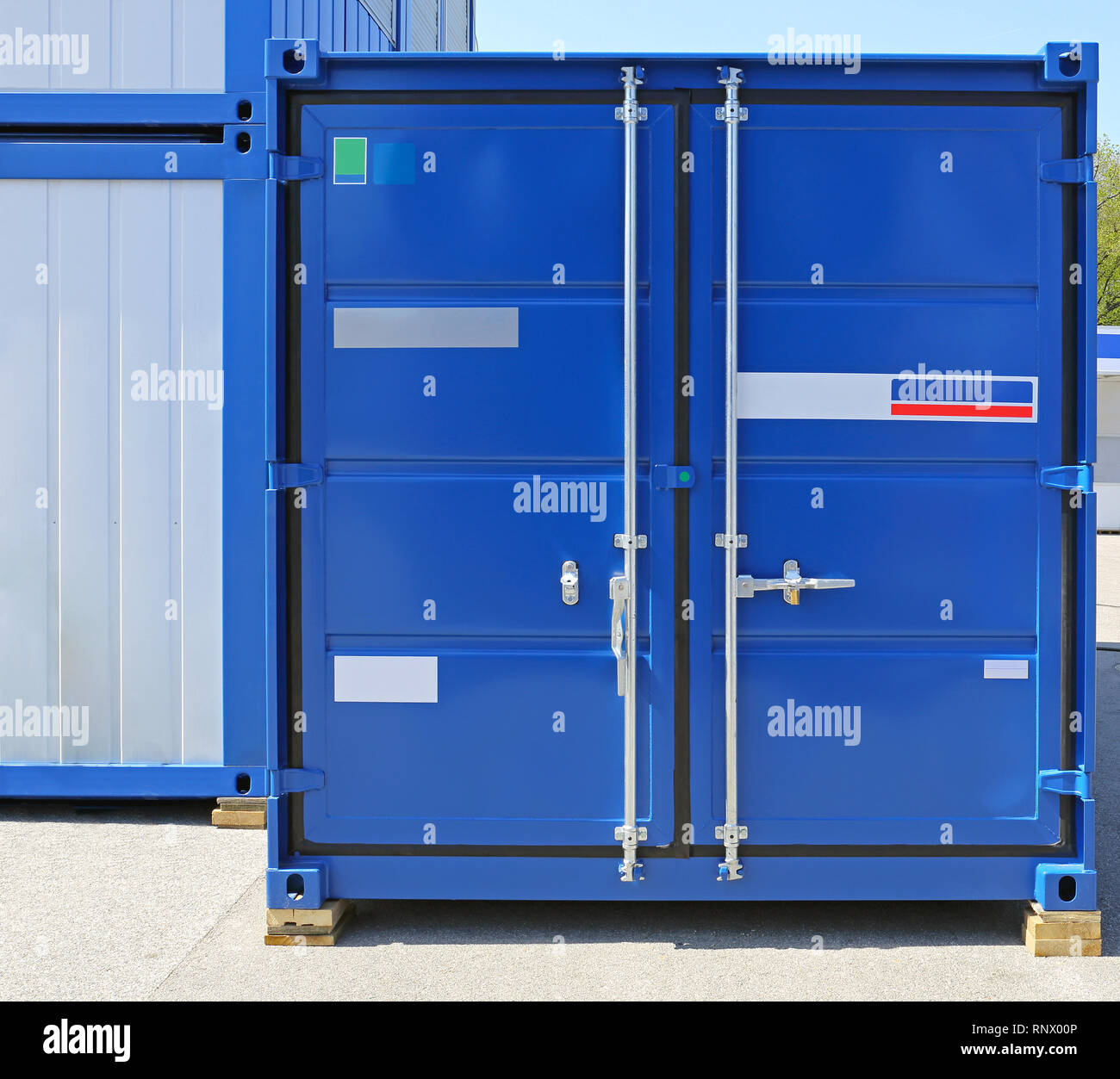 Blue Cargo Container Ready for Shipping Stock Photo - Alamy