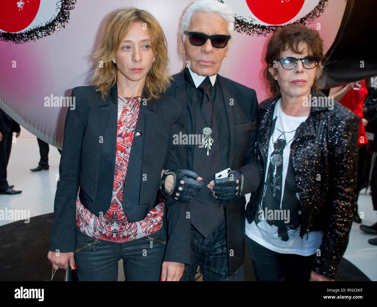 Sylvie Testut, Karl Lagerfeld and Dani attends at the Sho Uemura event at  Espace Commines in Paris. German fashion designer and creative director for  the french fashion brand Chanel Karl Lagerfeld died