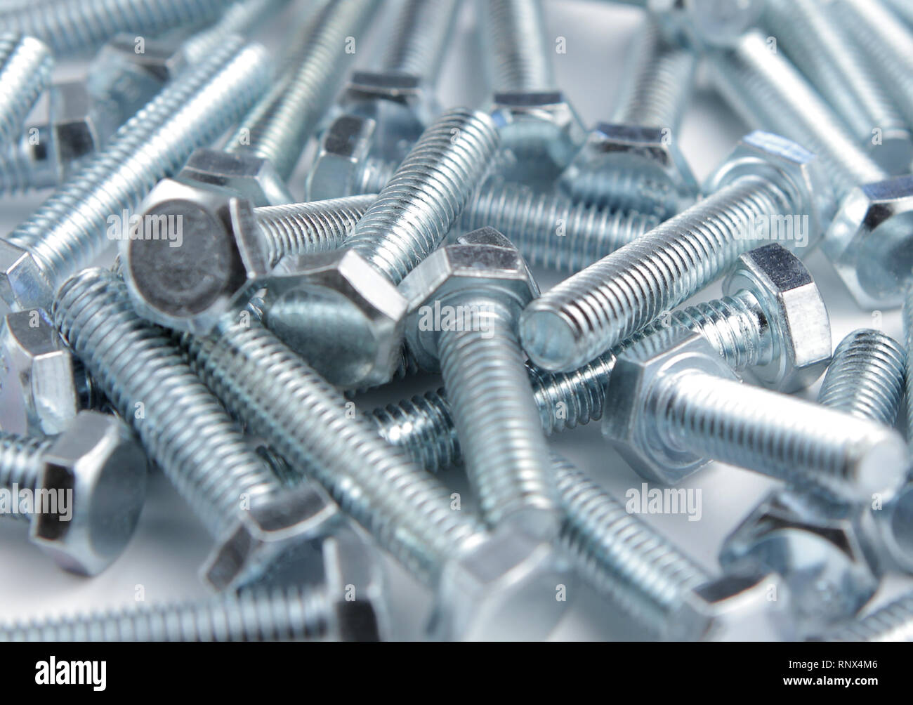 Stack of shiny nuts on a white background Stock Photo