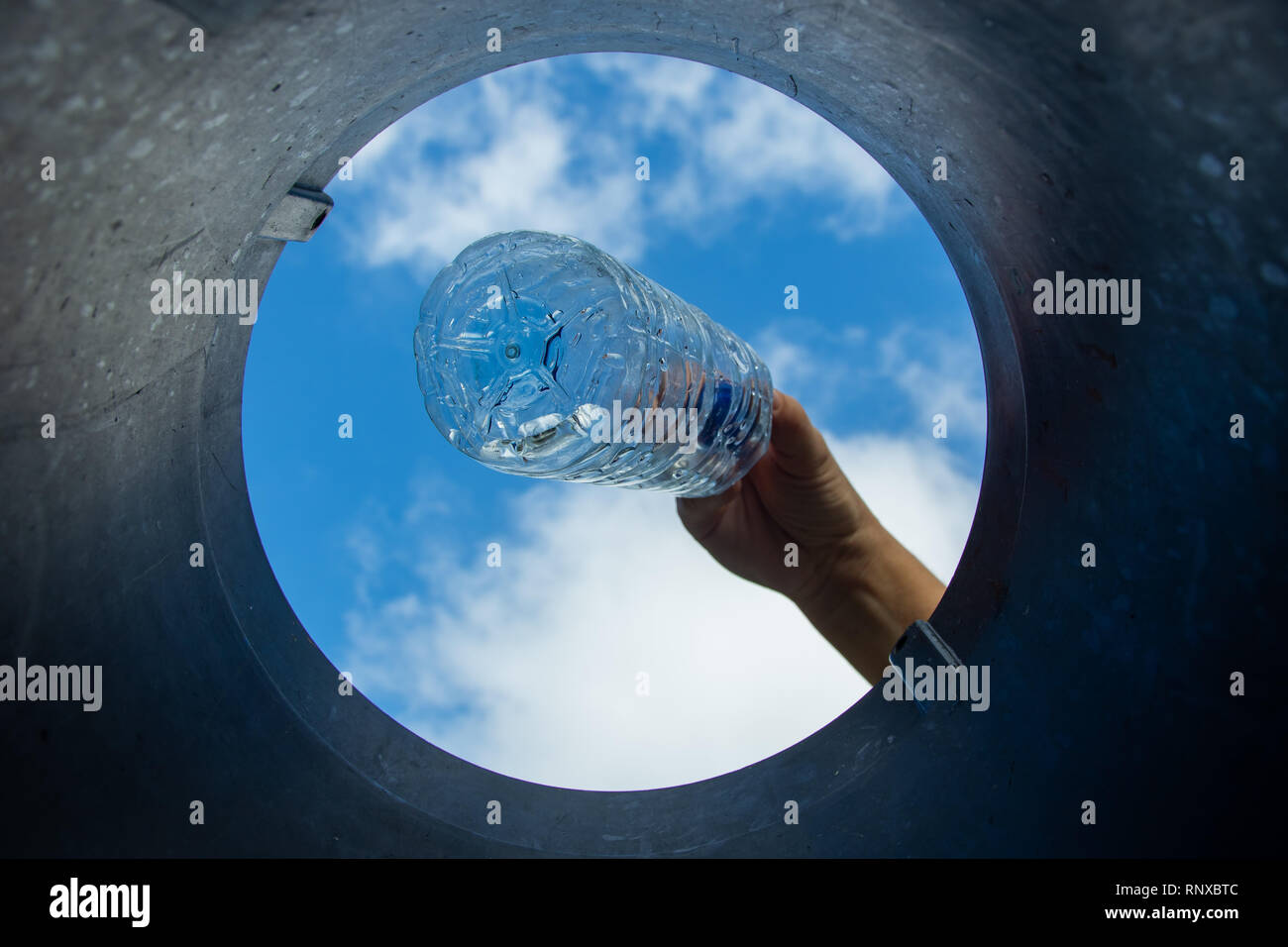 Plastic bottle, recycling, put it in the bin Stock Photo Alamy