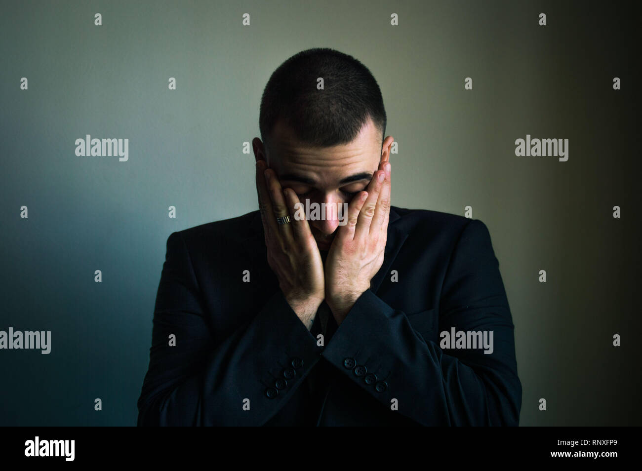 Man feeling tired upsed drepressed Stock Photo