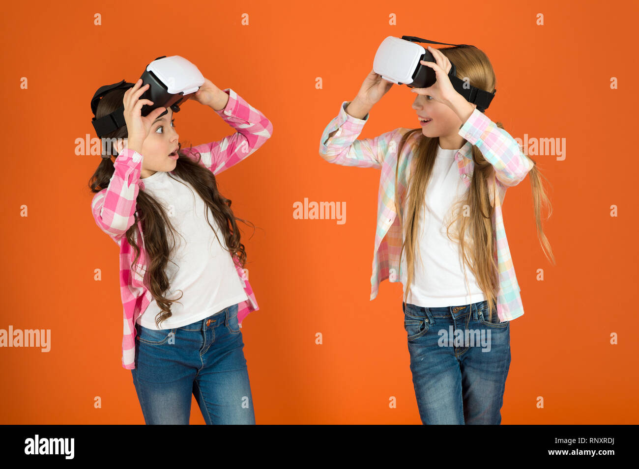 Discover virtual reality. Kids girls play virtual reality game. Friends  interact in vr. Explore alternative reality. Future is present. Cyber space  and virtual gaming. Virtual reality technology Stock Photo - Alamy