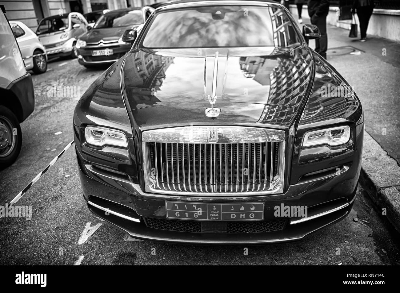 Paris, France - September 26, 23, 2017: luxury Supercar rolls royce rolls-royce ghost blue and gold color parked on the street in Paris. rolls royce rolls-royce is famous expensive automobile brand car Stock Photo