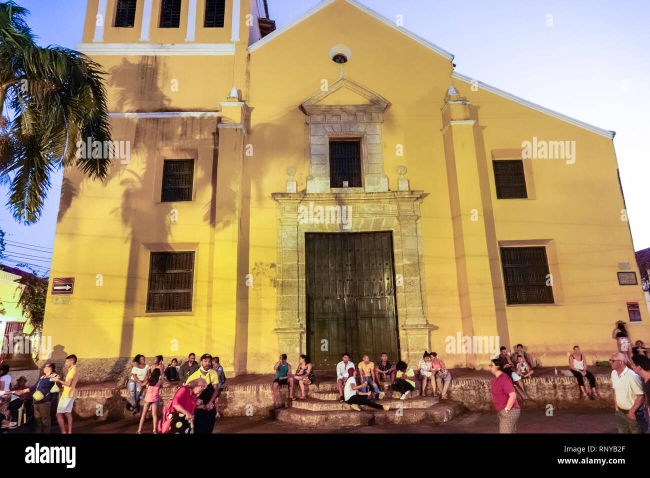 Cartagena Colombia,Center,centre,Getsemani,Iglesia Plaza de la Santisima Trinidad Holy Trinity Church Square,night evening dusk,gathering place,Hispan Stock Photo