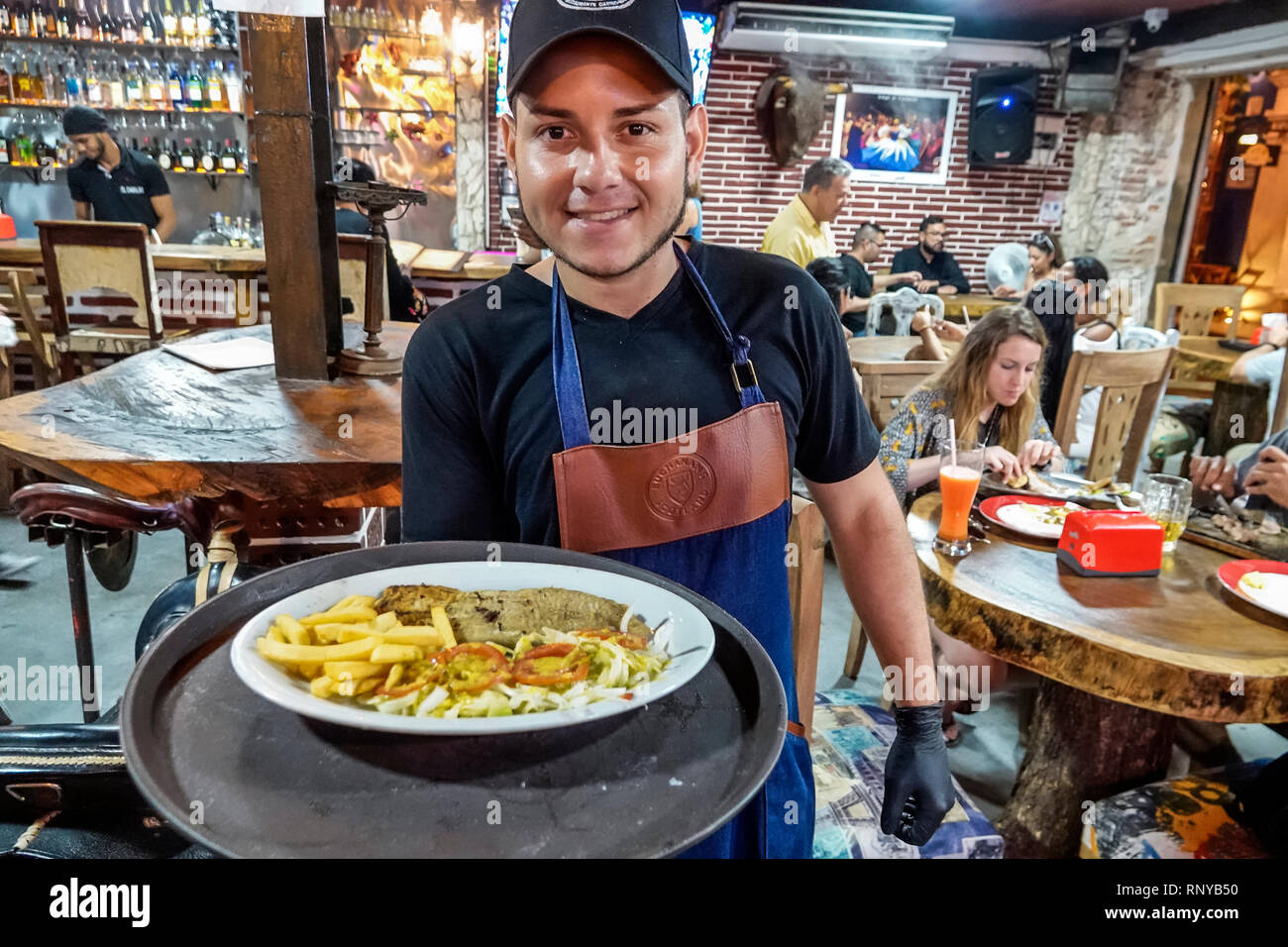 Cartagena Colombia,Center,centre,Getsemani,El Cabildo,restaurant restaurants food dining cafe,inside interior,Hispanic man men male,job,working work w Stock Photo