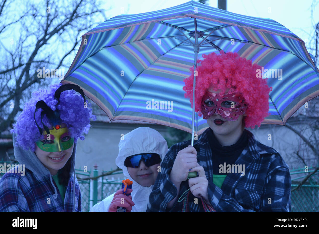 Three kids dressed up for a Slavic carnival, Svilajnac, Serbia, Europe Stock Photo