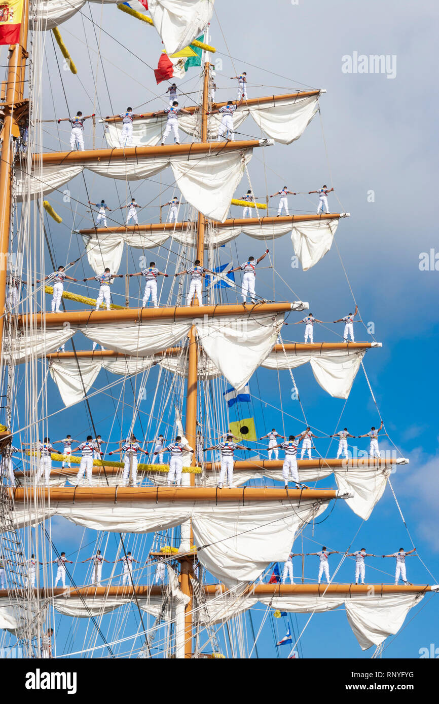 Crew climbing the rigging of Mexican navy training ship, Cuauhtemoc. Stock Photo