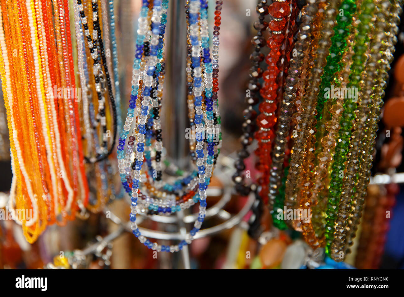 different colorful handmade beads at african flea market Stock Photo