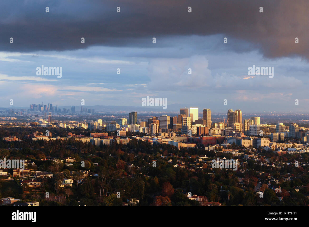 Clouds frame the city of the Los Angeles after a rainstorm from ocean to mountains as photographed from the Getty Center art complex. Stock Photo