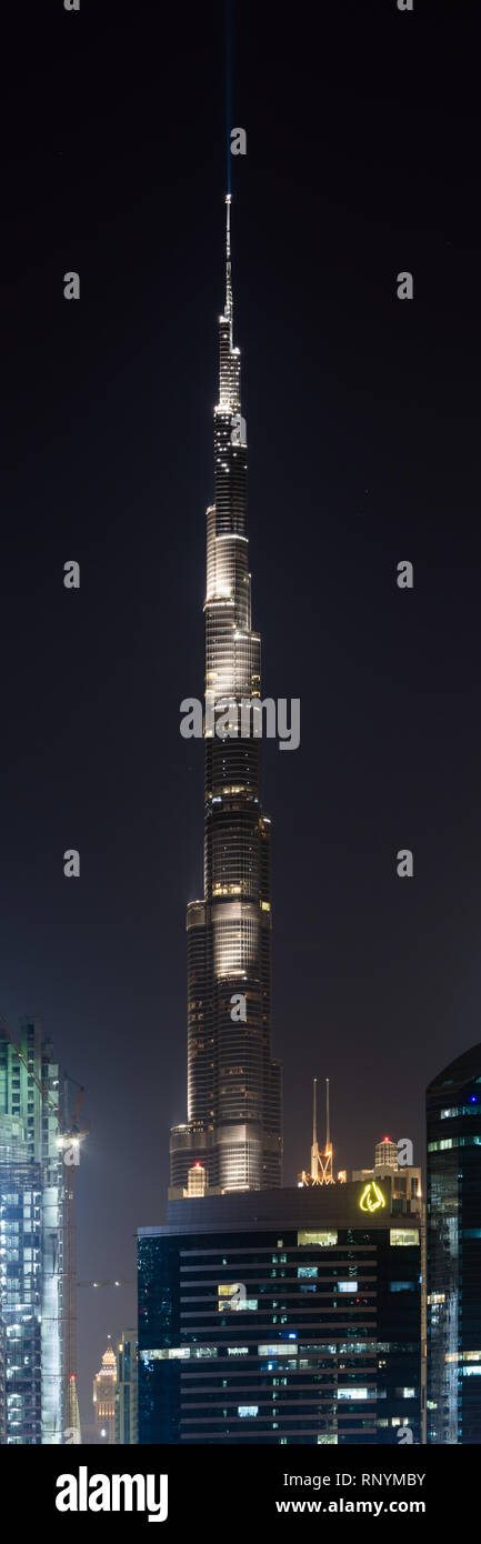 DUBAI, UAE - February 17, 2018: Vertical panorama of Burj Khalifa, tallest building in the world, Dubai at night Stock Photo