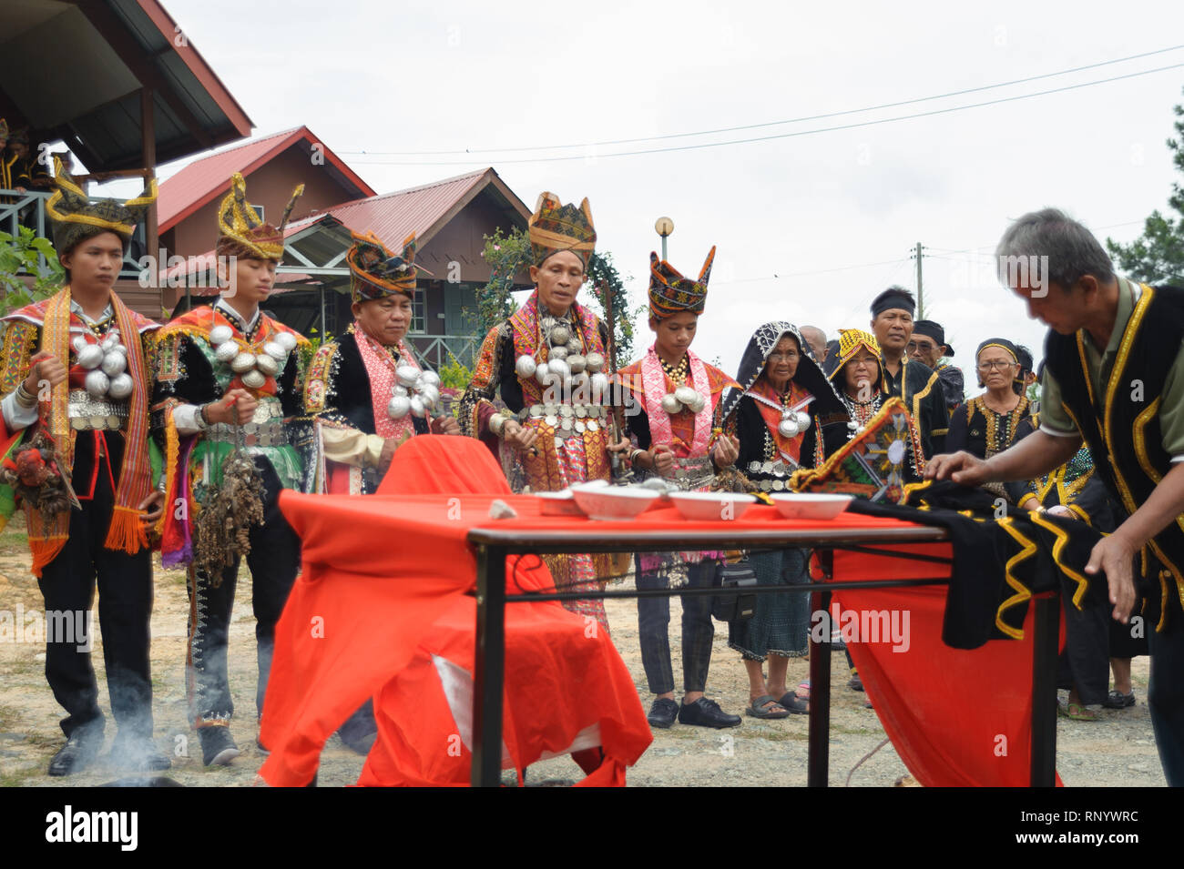 Kundasang Sabah, Malaysia - Jul 3, 2015 : Dusun ethnic shaman performing ritual to appease the spirit of Akinabalu the guardian of Mount Kinabalu. Stock Photo