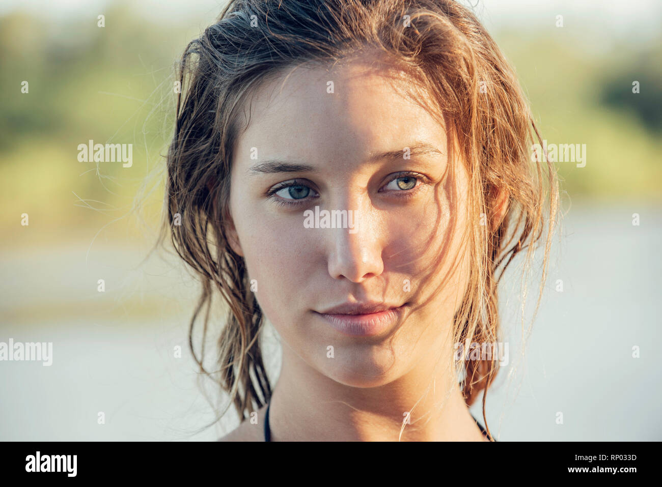 Close-up of young woman standing outdoors Stock Photo