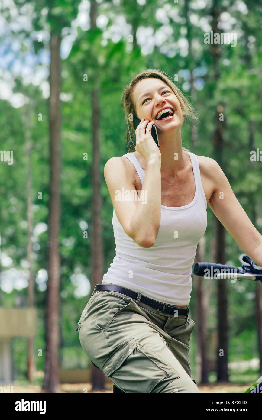 Mature woman talking on smart phone Stock Photo - Alamy