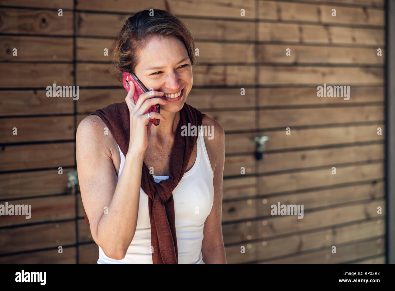 Mature woman talking on smart phone Stock Photo - Alamy
