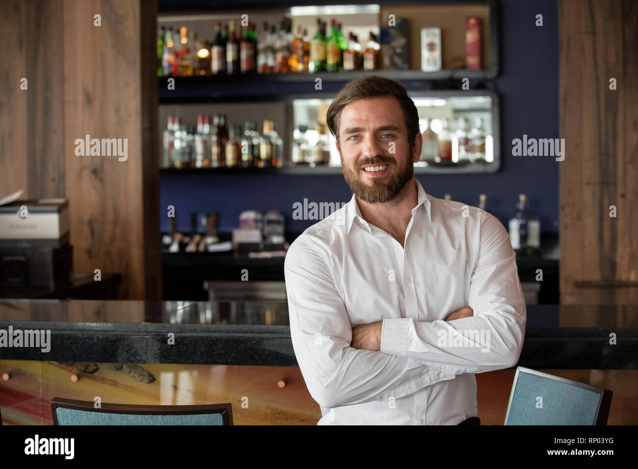 One man male standing at counter hi-res stock photography and images ...