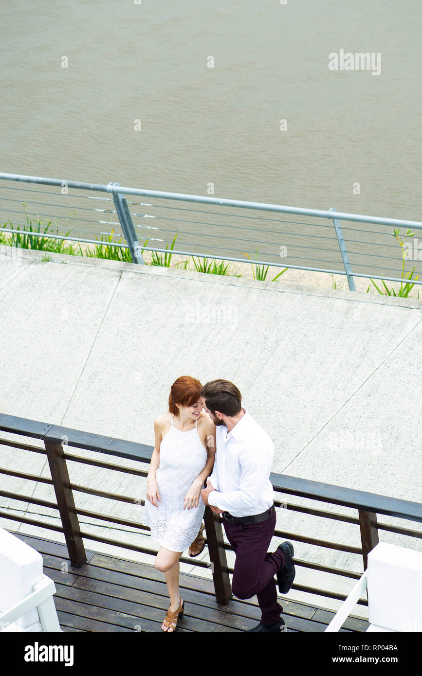 Couple standing on hotel balcony Stock Photo