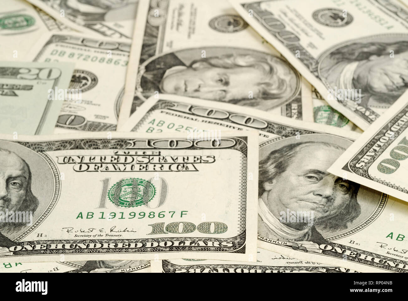 Close-up on many hundred-dollar bills Stock Photo