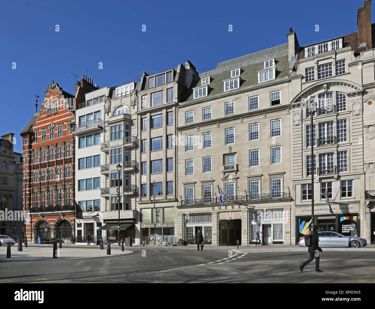 Classical buildings on Pall Mall, London. Shows Quebec House (centre) and Commonwealth House (right). Corner of St James's Street (left). Stock Photo