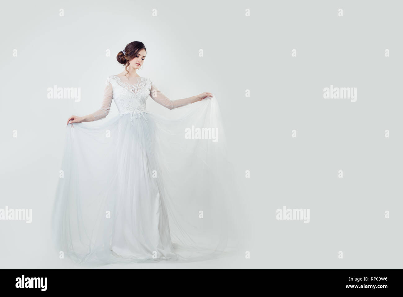Bride woman in wedding dress on white banner background Stock Photo - Alamy
