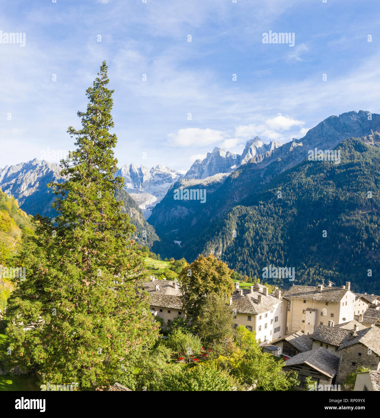 Panoramic of Soglio with Sciore group, Pizzo Cengalo and Badile on background, Bregaglia Valley, Maloja Region, Canton of Graubunden, Switzerland Stock Photo