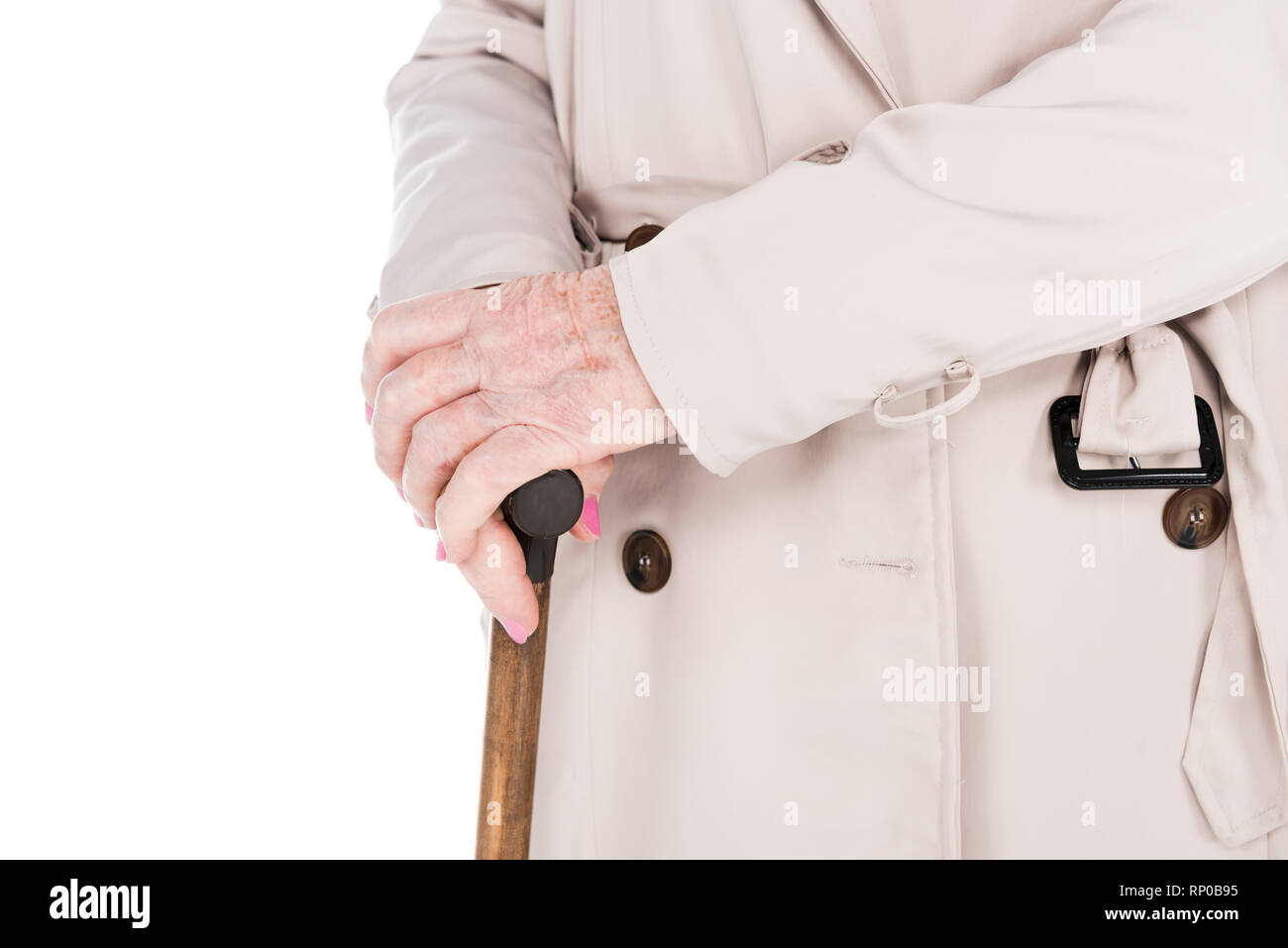 cropped view of senior woman holding walking cane isolated on white Stock Photo