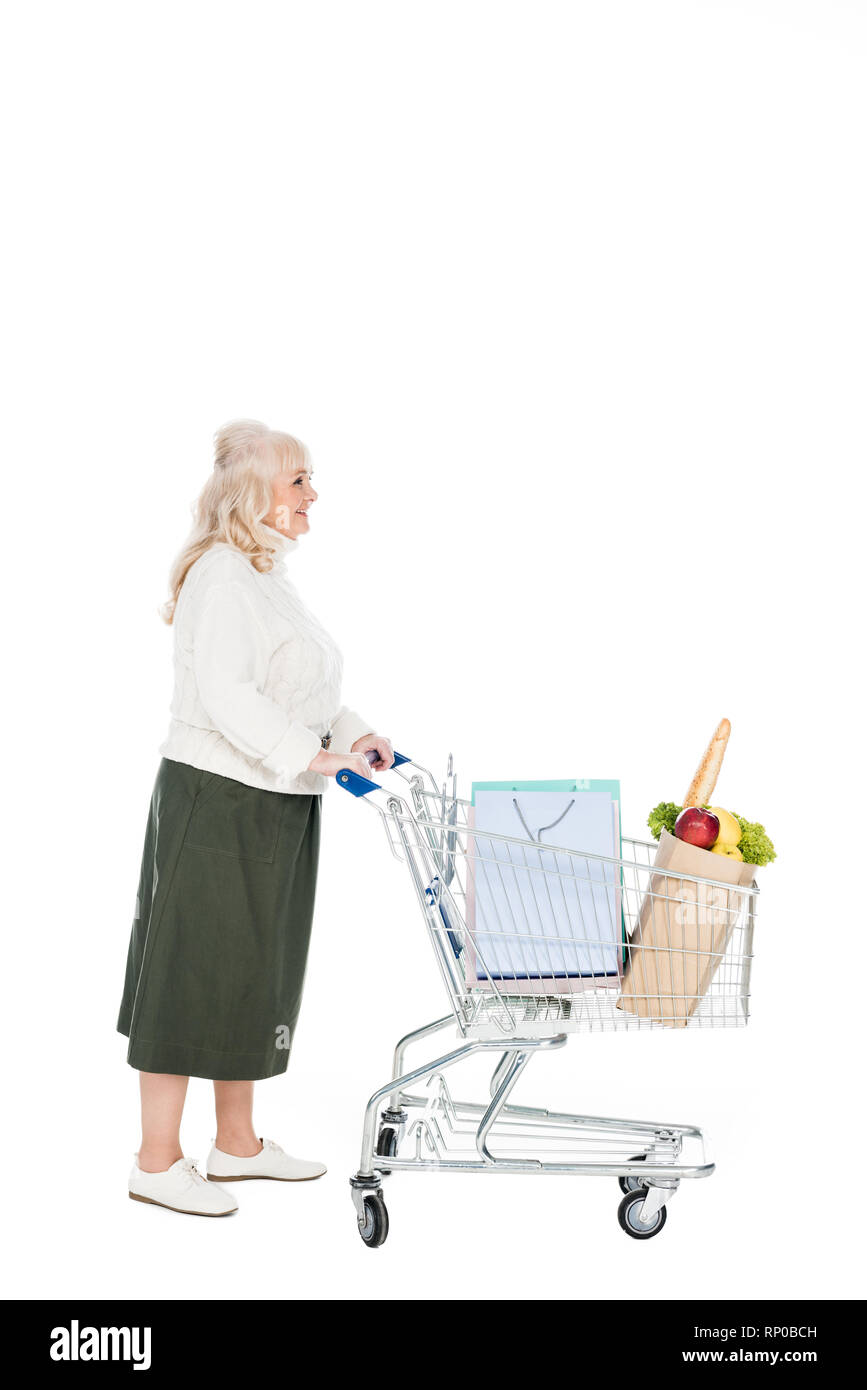 Old woman shopping cart on Cut Out Stock Images & Pictures - Alamy