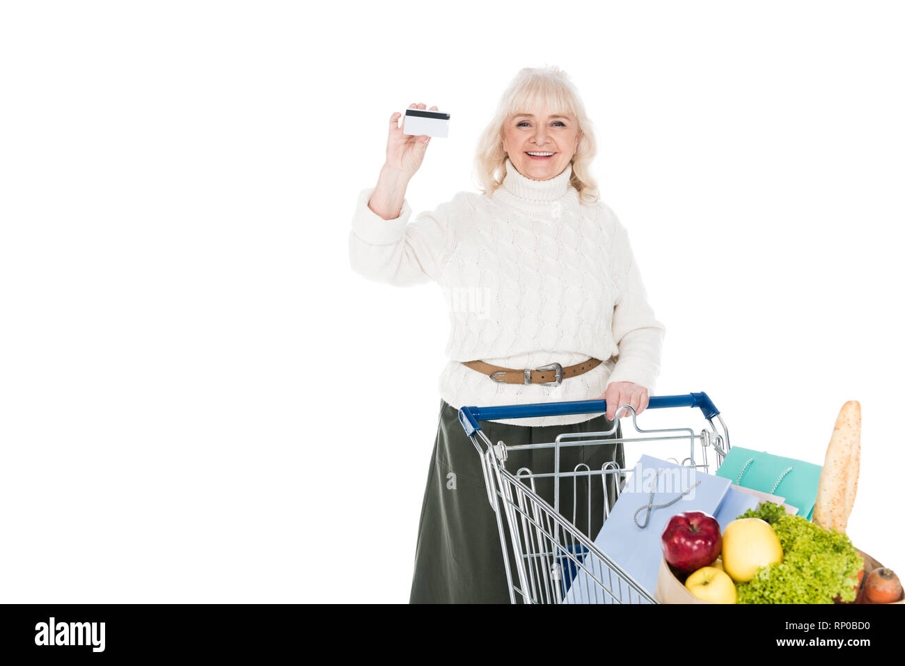 Elderly woman shopping trolley hi-res stock photography and images - Alamy