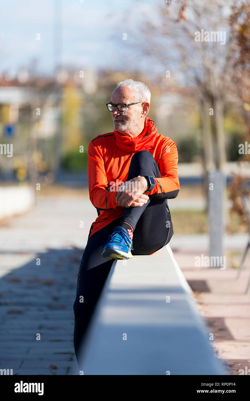 Relaxed adult man sitting hi-res stock photography and images - Alamy