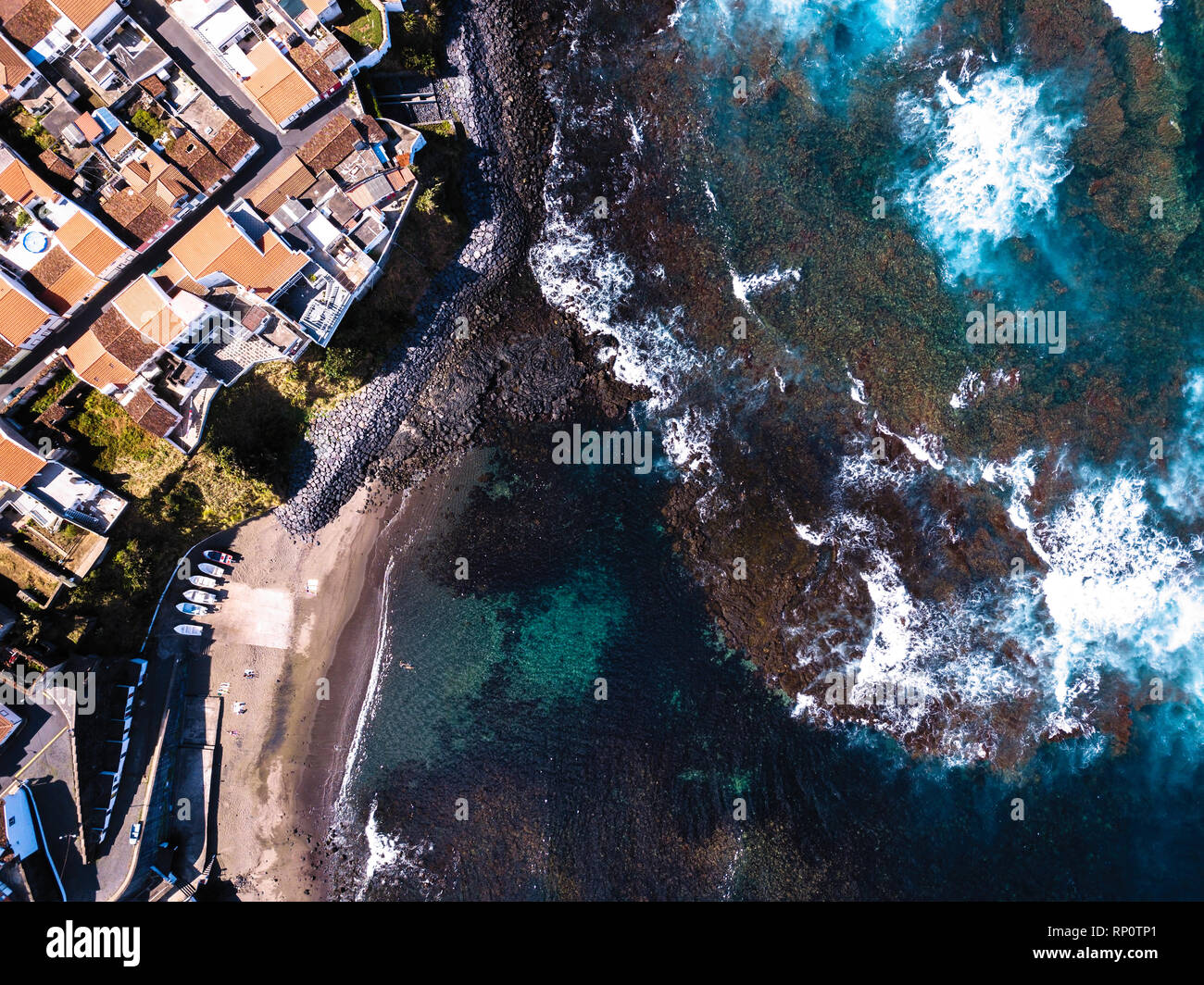 Bird's eye view of the ocean surf on the reefs coast of San Miguel ...
