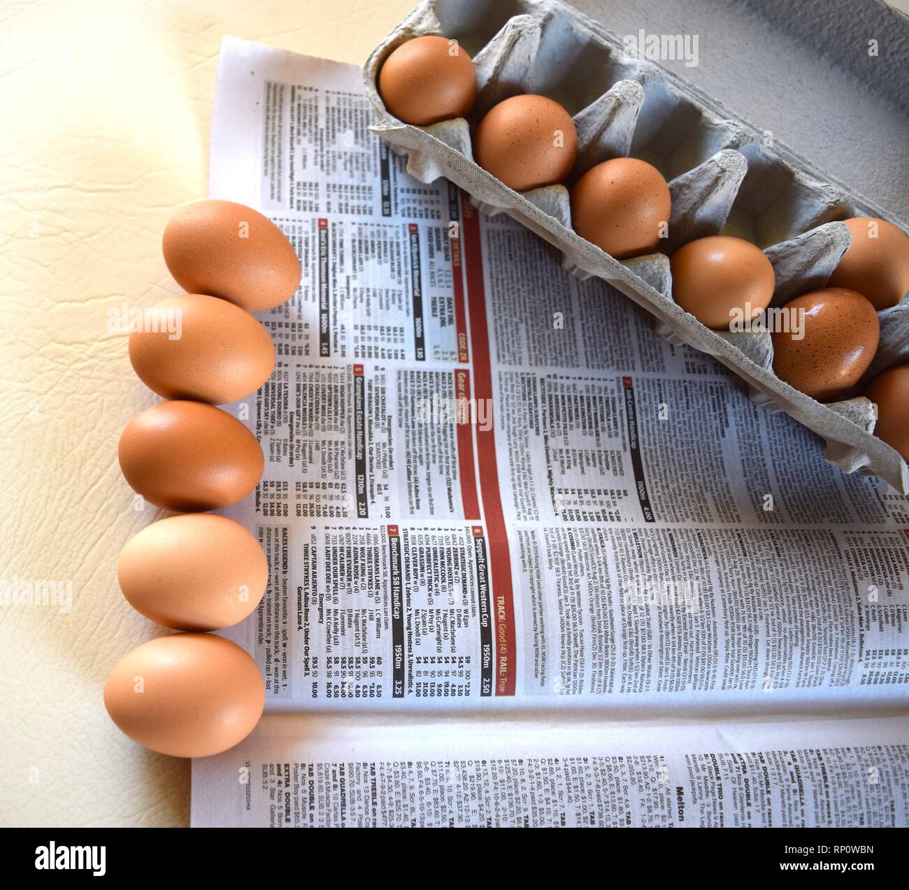 Easter design with eggs and newspapers Stock Photo Alamy