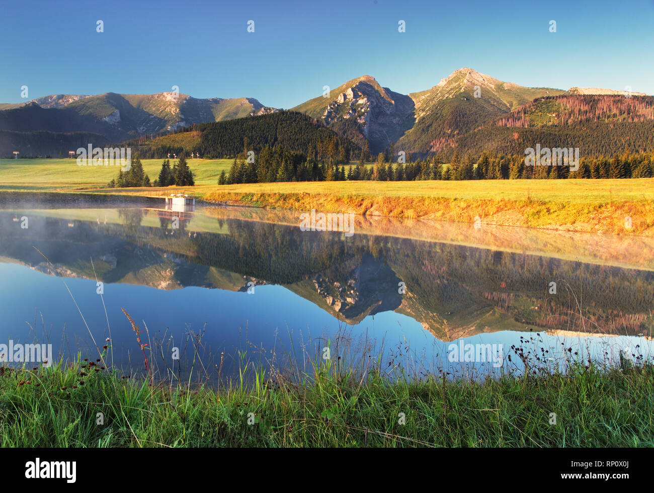 Mountain reflection in water - Belianske Tatry, Slovakia Stock Photo