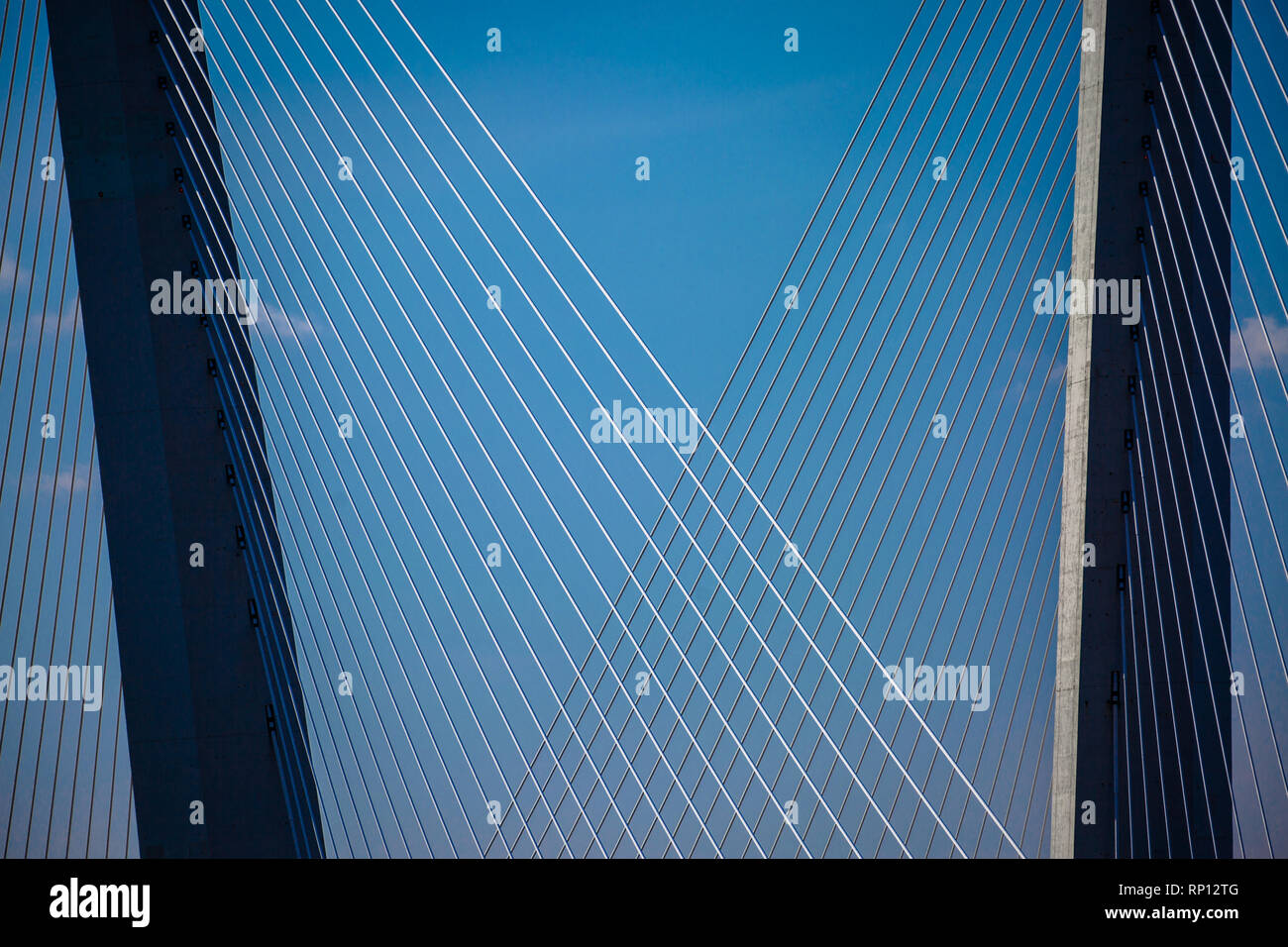 An abstract close-up of the supporting cables and pillars of Zolotoy Bridge. Stock Photo