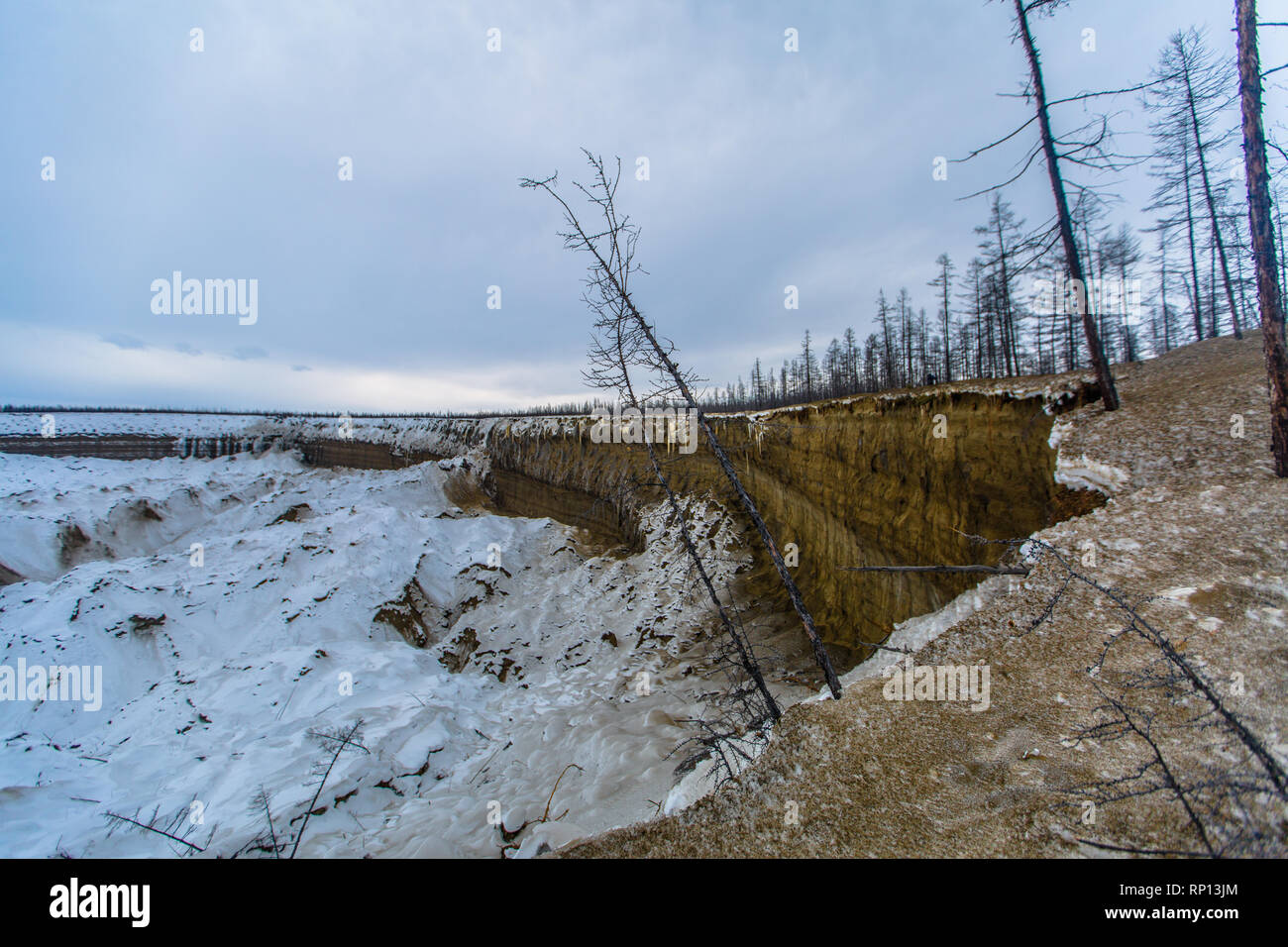 A huge thermokarst crater showing the damage to the permafrost and our climate,  Batagay, Russia Stock Photo