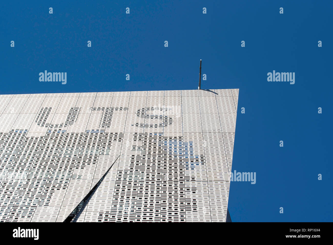 University of Technology Sydney Building 11, Faculty of Engineering and IT Building on Broadway is covered in an alloy binary screen of 1's and zeros Stock Photo