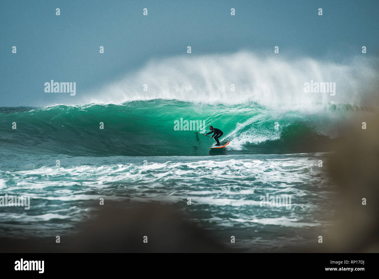 Porthleven Harbour Pier Surf Reef Stand Up Paddle Board Barrel Wave taken on 2019 01 20 Stock Photo