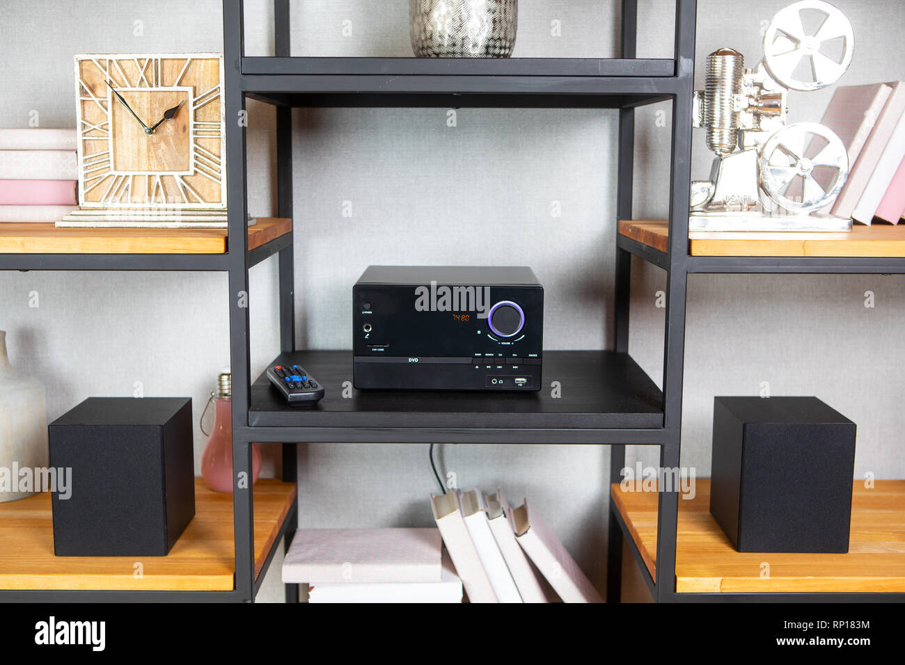 Compact CD radio player on the shelf in vintage interior Stock Photo
