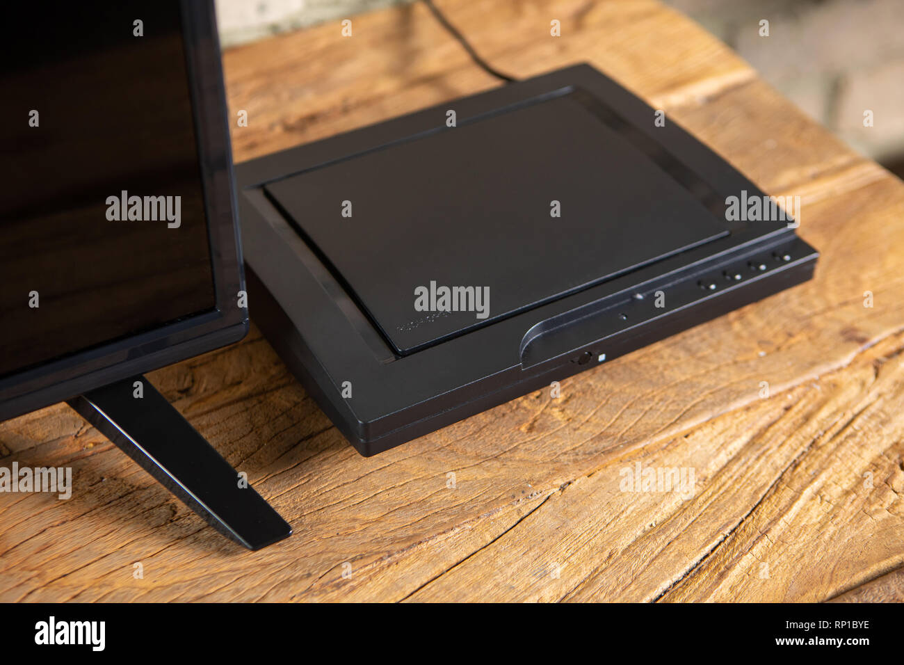 Compact DVD player in the interior on the TV Stock Photo Alamy