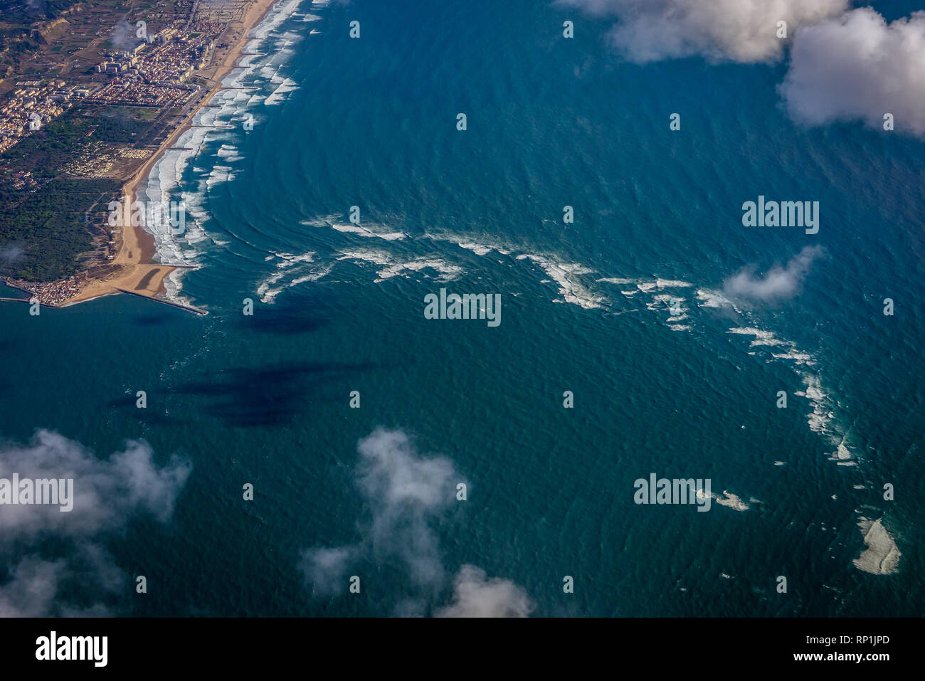 View from plane window on a Tagus River empties into the Atlantic Ocean near Lisbon, Portugal Stock Photo
