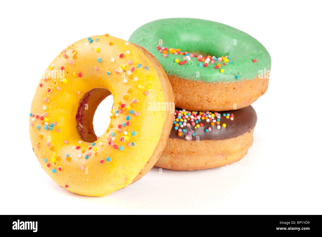 three glazed donut isolated on white background Stock Photo - Alamy