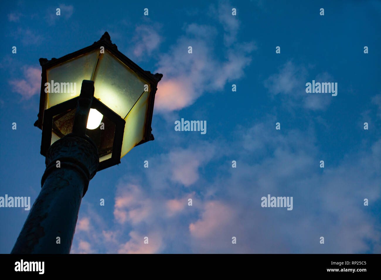 Street lighting at night with white bulb. Old retro street lighting