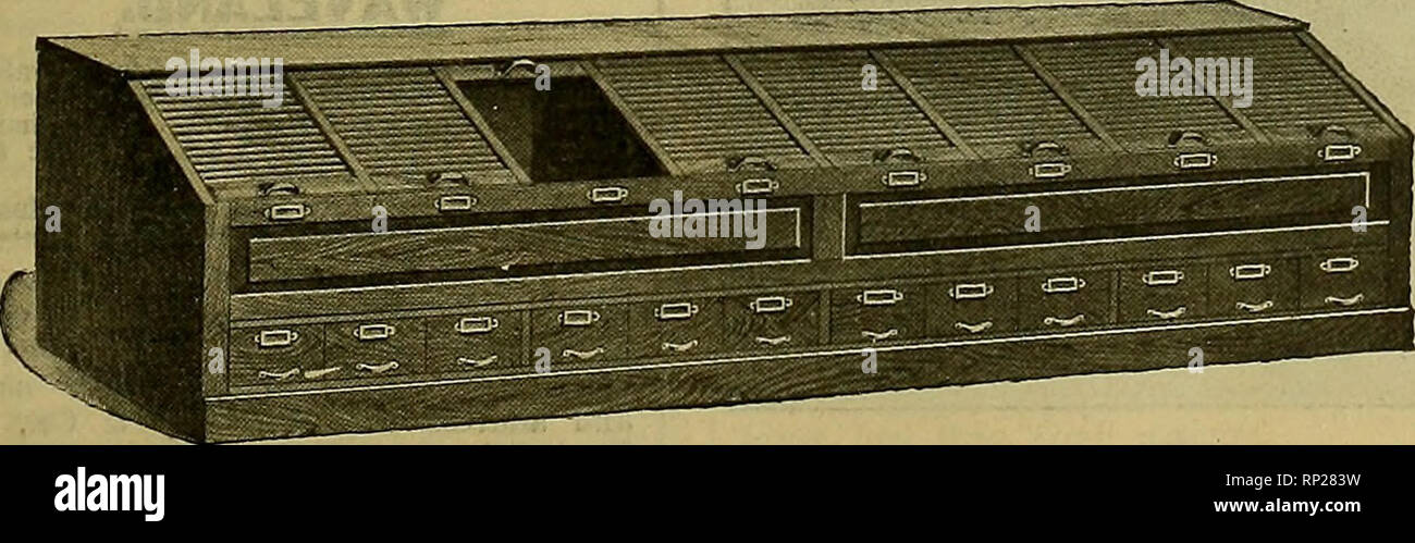 . The American florist : a weekly journal for the trade. Floriculture; Florists. L. L. May &amp; CO., St. Paul, Minn. Our illustration ahows the seed ware- liou.se recently erected by L. L. May &amp; Co., of St. Paul, Minn., on Como ave- nue, of that city. It is thoroughly fire- proof, being built entirely of reinforced concrete. The floor area is 50,000 square feet. Its railroad facilities for loading and unloading cars are excellent, the seed being conducted from car direct to the bins by means of chutes, the capacity being 500 bags a day. Three packet making machines, whose capacity is 150, Stock Photo