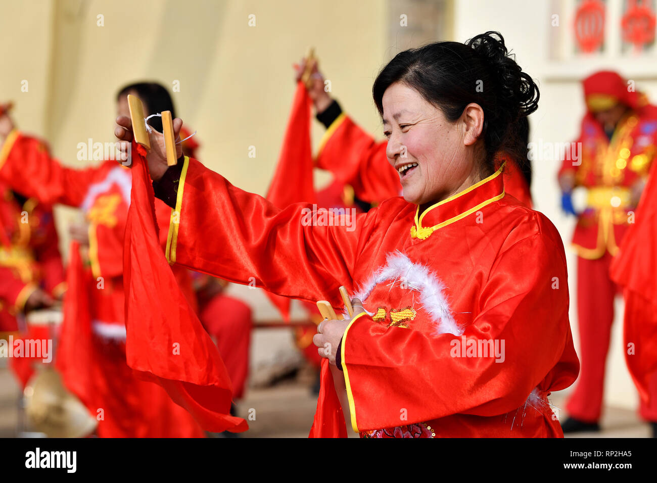 (190220) -- WUXIANG, Feb. 20, 2019 (Xinhua) -- Villagers perform folk art in Wangzhuanggou Village, Wuxiang County of north China's Shanxi Province, Feb. 19, 2019. For generations, residents of Wangzhuanggou Village barely scraped a living as a result of geographical isolation. However, a great change has been made since a series of poverty relief programs were launched in 2014. The whole village has been lifted out of poverty by the year of 2018 with the per capita annual income rising to 6,100 yuan (907 U.S. dollars) that enables villagers to spend on an grand celebration of the Spring Festi Stock Photo