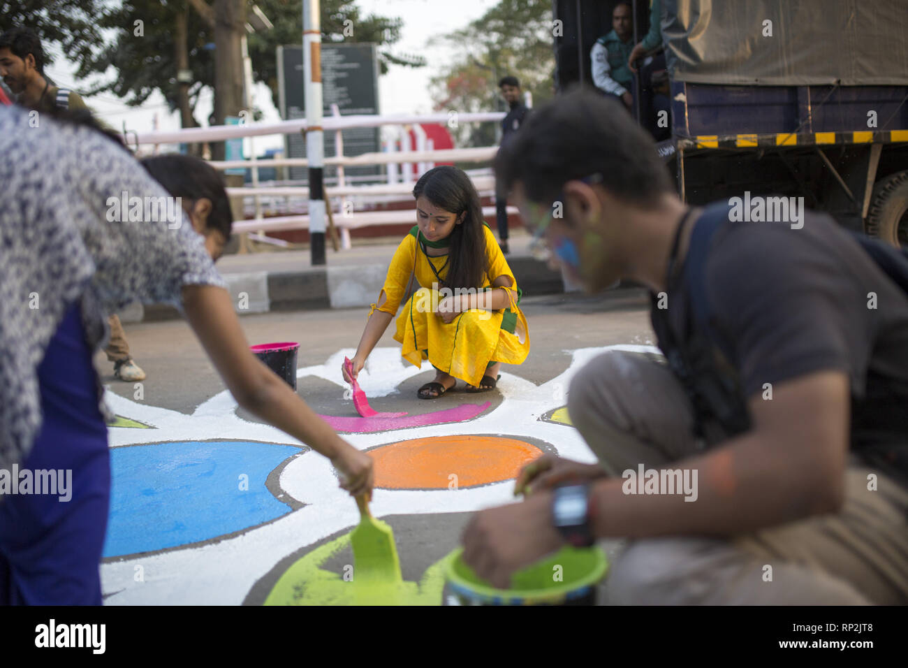 Dhaka, Bangladesh. 20th Feb, 2019. FEBRUARY 20 : Bangladeshi students paints on the street as part of the decoration for the International Mother Language Day celebration in front of the language matyrs monument in Dhaka, Bangladesh on February 20, 2019.The nation will pay tribute to the Bangla language movement martyrs who sacrificed their life for their mother tongue in 1952, while the United Nations Educational Scientific and Cultural Organization (UNESCO) declared 21 February as the International Mother Language Day. Credit: Zakir Hossain Chowdhury/ZUMA Wire/Alamy Live News Stock Photo