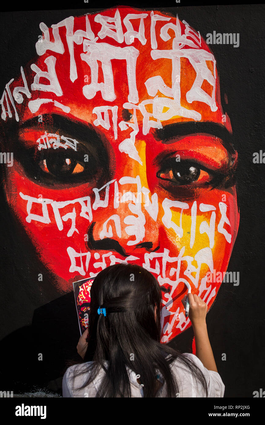 Dhaka, Bangladesh. 20th Feb, 2019.  Bangladeshi students paints on the wall as part of the decoration for the International Mother Language Day celebration in front of the language matyrs monument  in Dhaka, Bangladesh on February 20, 2019.  The nation will pay tribute to the Bangla language movement martyrs who sacrificed their life for their mother tongue in 1952, while the United Nations Educational Scientific and Cultural Organization (UNESCO) declared 21 February as the International Mother Language Day. Credit: zakir hossain chowdhury zakir/Alamy Live New Stock Photo