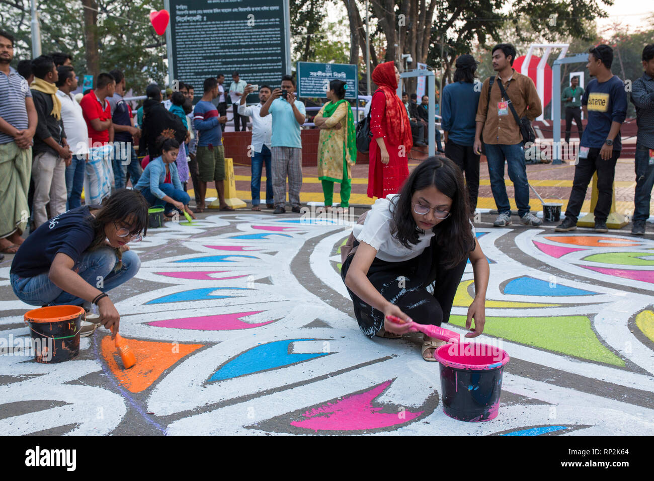 Dhaka, Bangladesh. 20th Feb, 2019.  Bangladeshi students paints on the street as part of the decoration for the International Mother Language Day celebration in front of the language matyrs monument  in Dhaka, Bangladesh on February 20, 2019.  The nation will pay tribute to the Bangla language movement martyrs who sacrificed their life for their mother tongue in 1952, while the United Nations Educational Scientific and Cultural Organization (UNESCO) declared 21 February as the International Mother Language Day. Credit: zakir hossain chowdhury zakir/Alamy Live N Stock Photo
