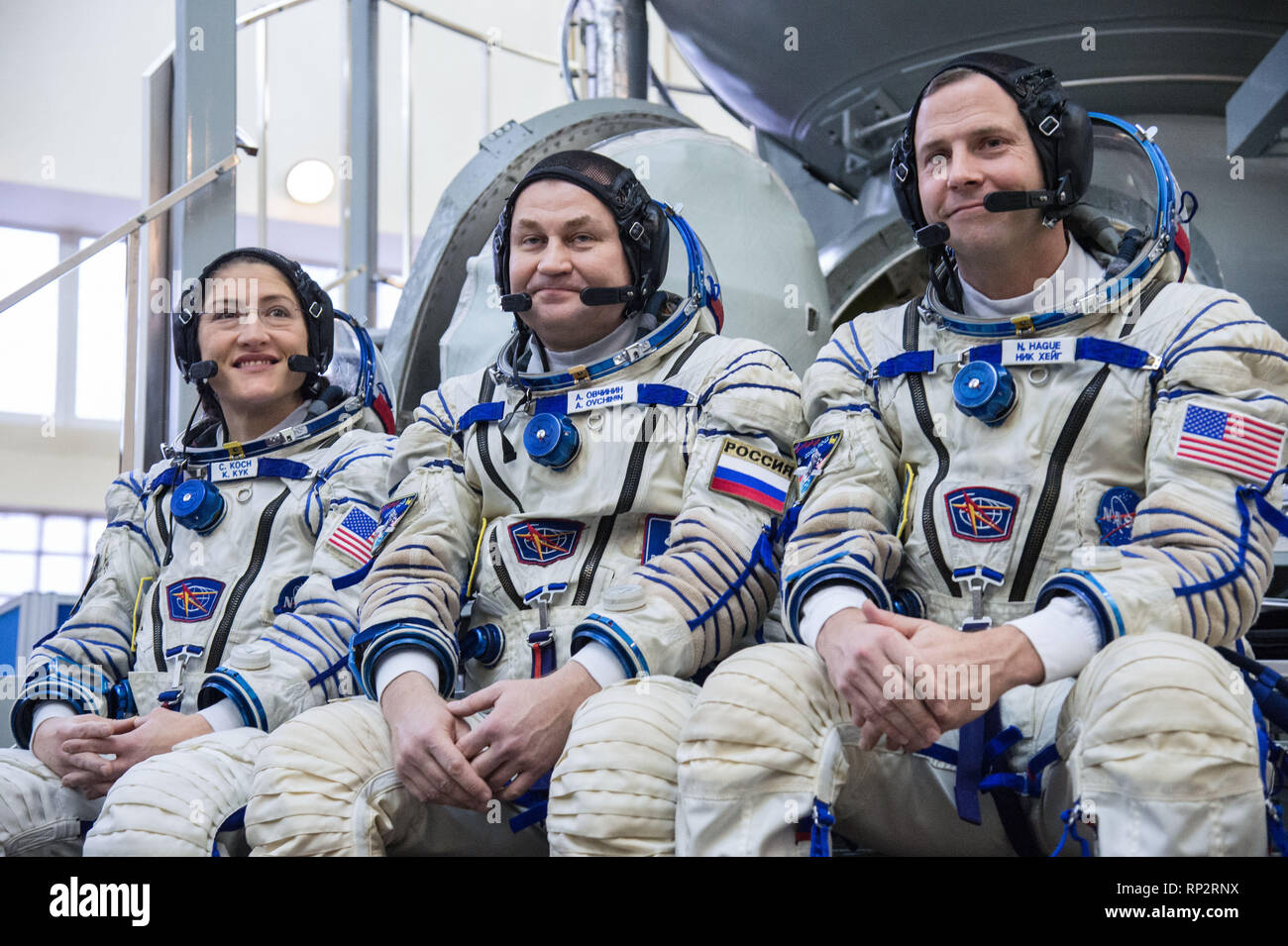 Star City, Russia. 20th Feb, 2019. International Space Station Expedition 59 crew members talk with the media on their Soyuz spacecraft simulator February 20, 2019 at Star City, Russia. Left to right are: Christina Koch of NASA, Alexey Ovchinin of Roscosmos, and Nick Hague of NASA. They crew will launch March 14th from the Baikonur Cosmodrome in Kazakhstan on the Soyuz MS-12 spacecraft for a six-and-a-half month mission on the International Space Station. Credit: Planetpix/Alamy Live News Stock Photo