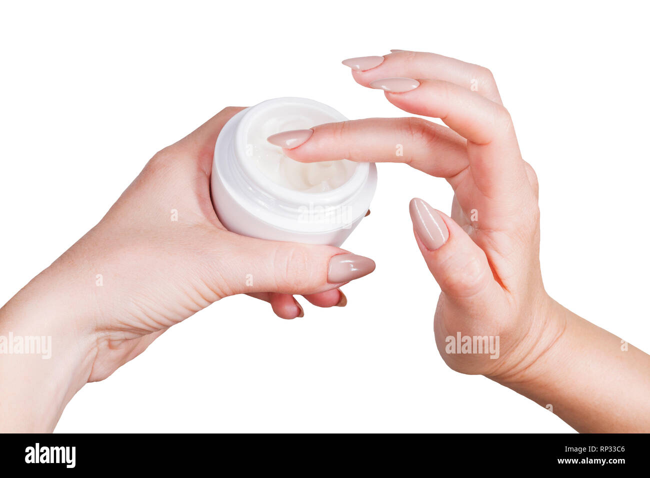 female hands are gaining cream from a jar , animals Stock Photo