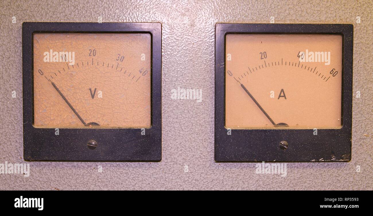 Analog ampere meter or amp meter and analog voltmeter. Stock Photo