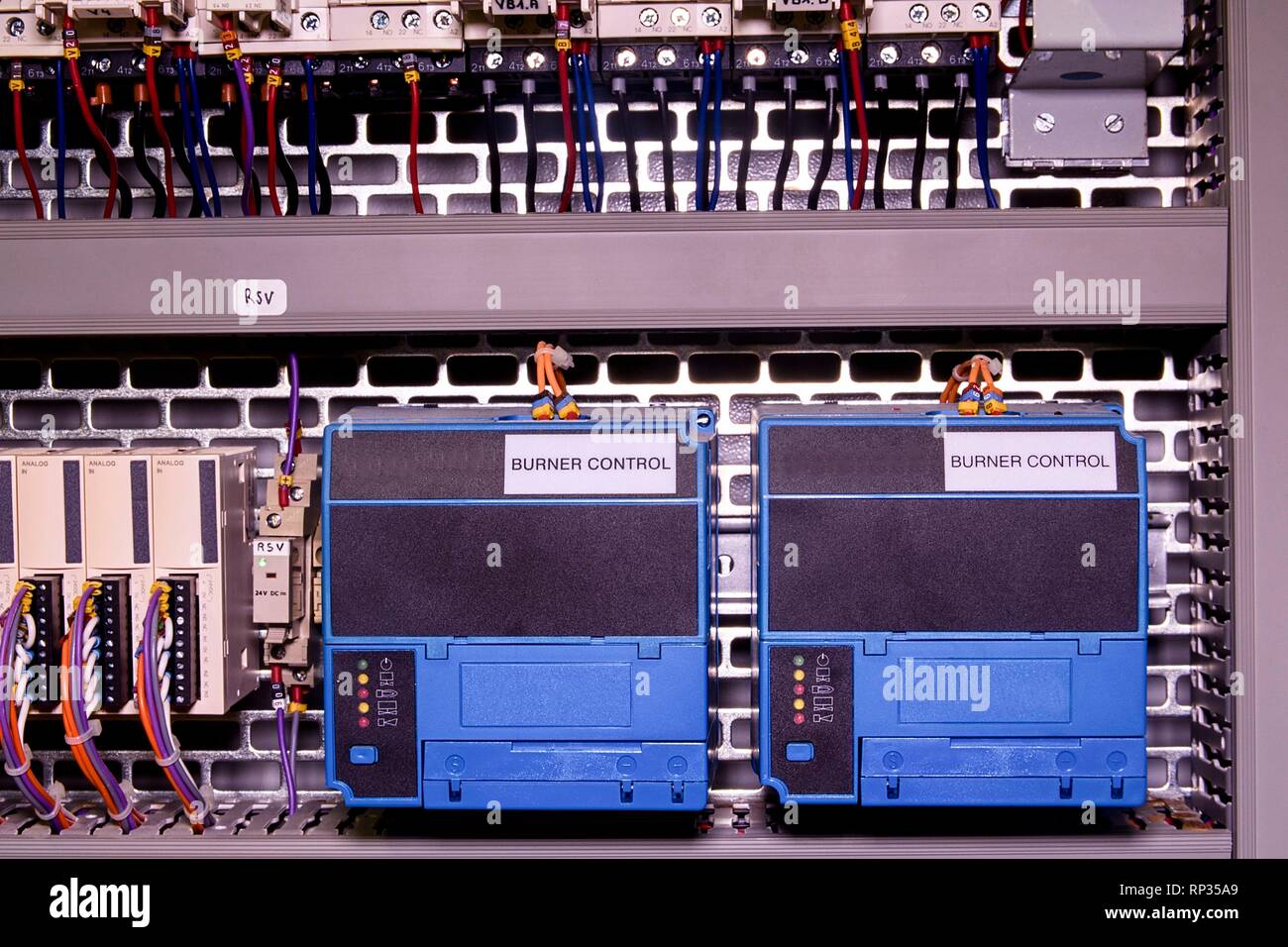 Image shows control cubicle. Electric device - burner control inside power case. Stock Photo